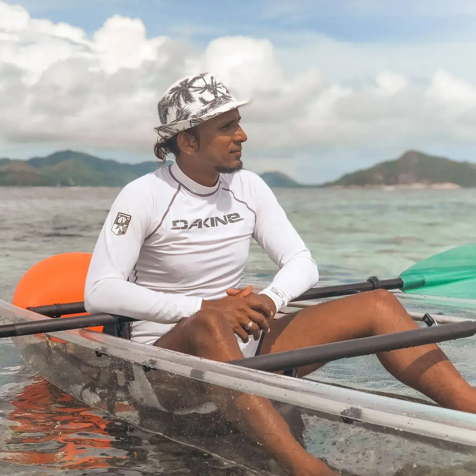 Anis, founder and tour leader, seated in a transparent kayak